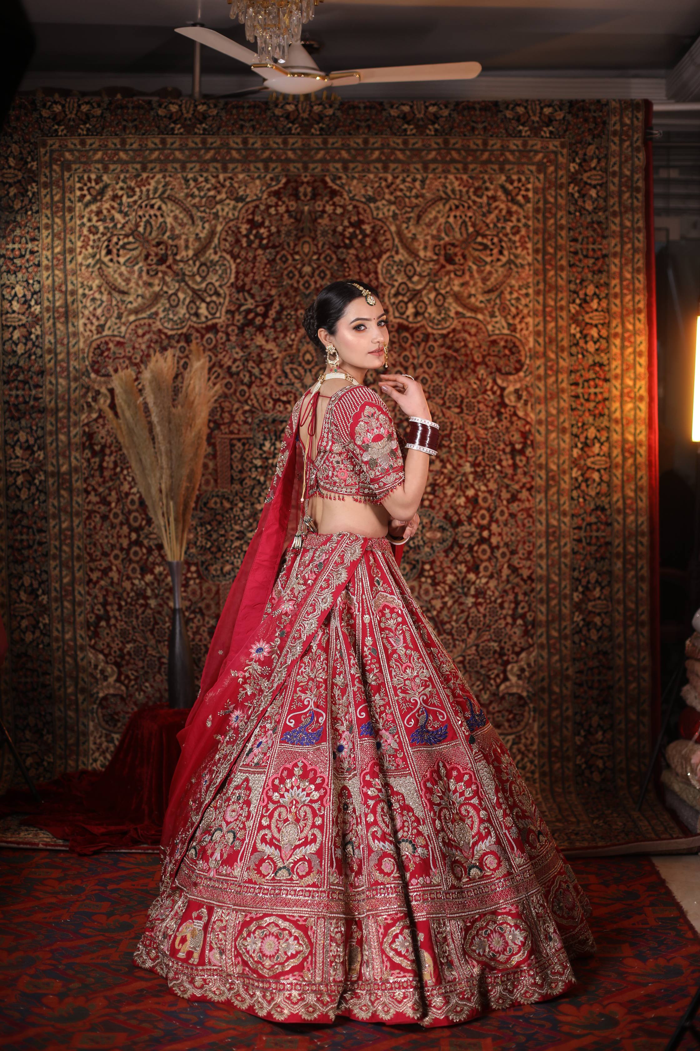 Luxurious Red Bridal Lehenga with Golden Zari Embroidery and Silk Dupatta