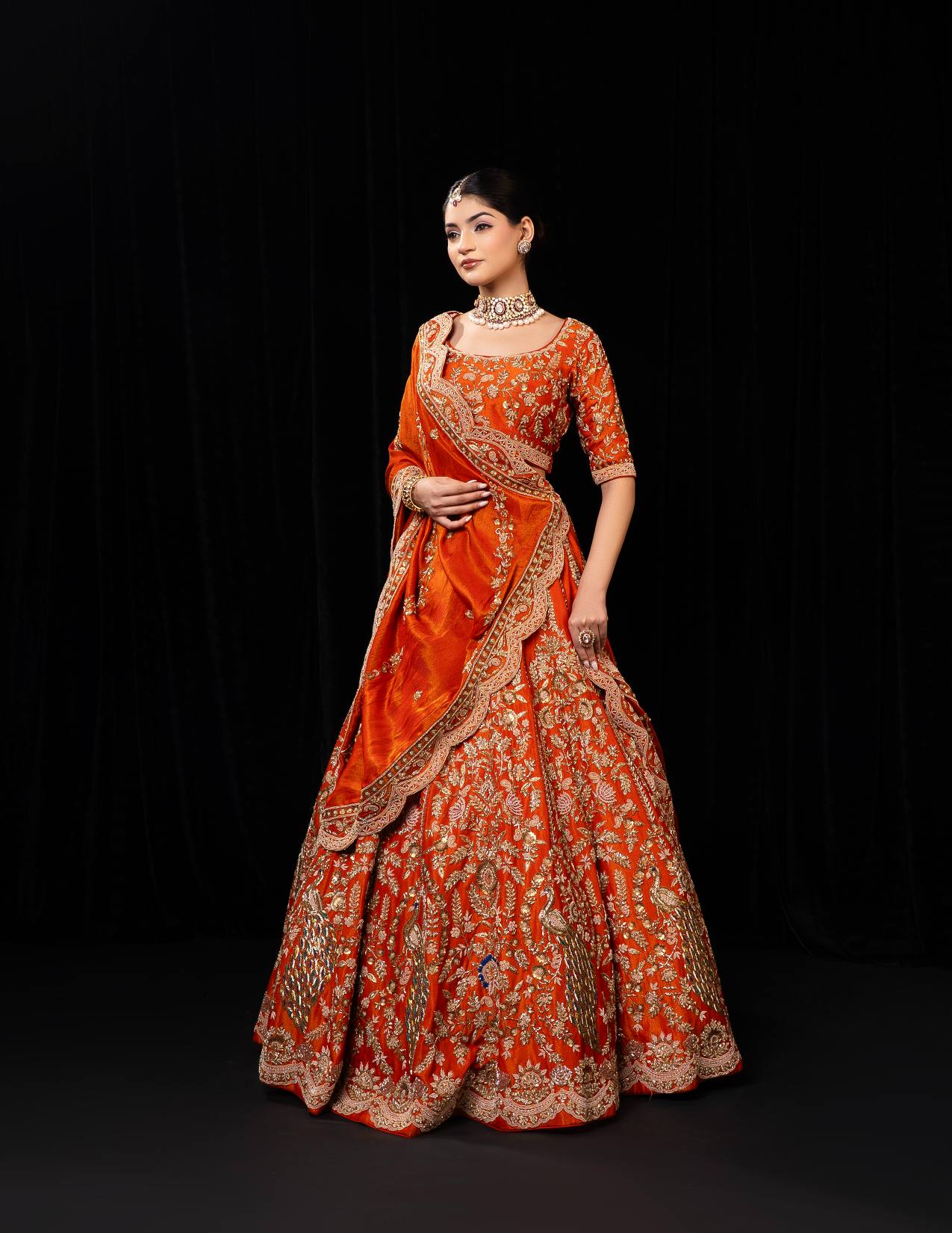 Majestic Orange Red Bridal Lehenga with Golden Zari and Sequin Embroidery