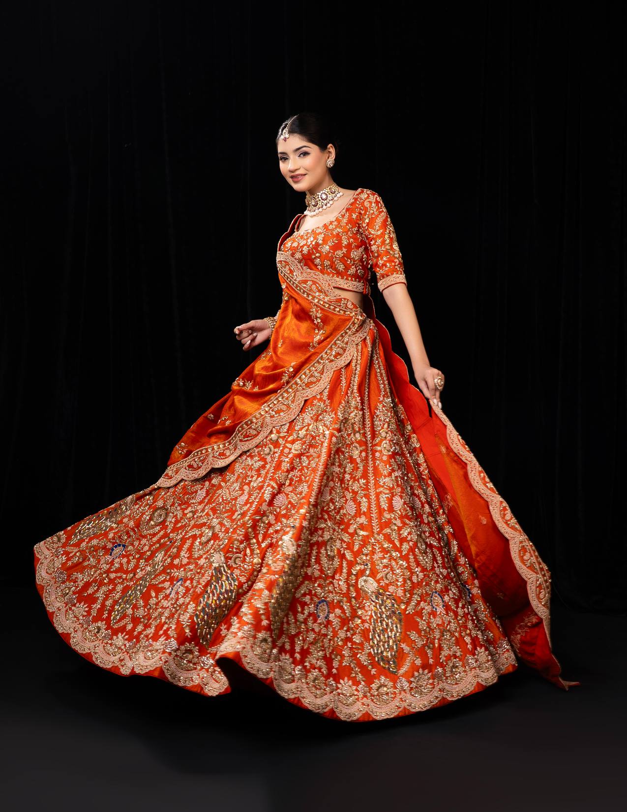 Majestic Orange Red Bridal Lehenga with Golden Zari and Sequin Embroidery