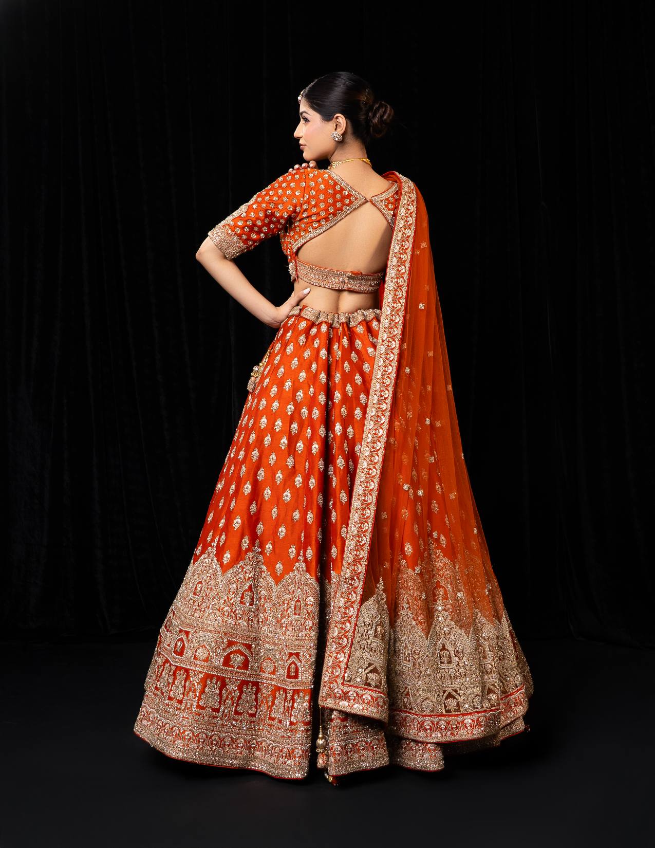 Opulent Orange Silk Bridal Lehenga with Heavy Golden Zari and Sequin Embroidery