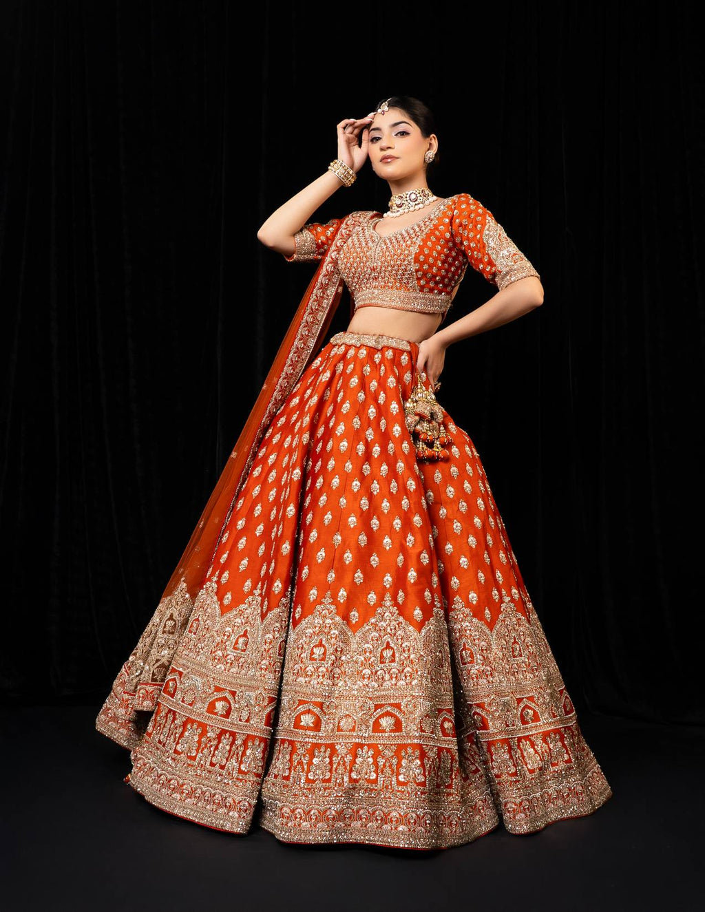 Opulent Orange Silk Bridal Lehenga with Heavy Golden Zari and Sequin Embroidery