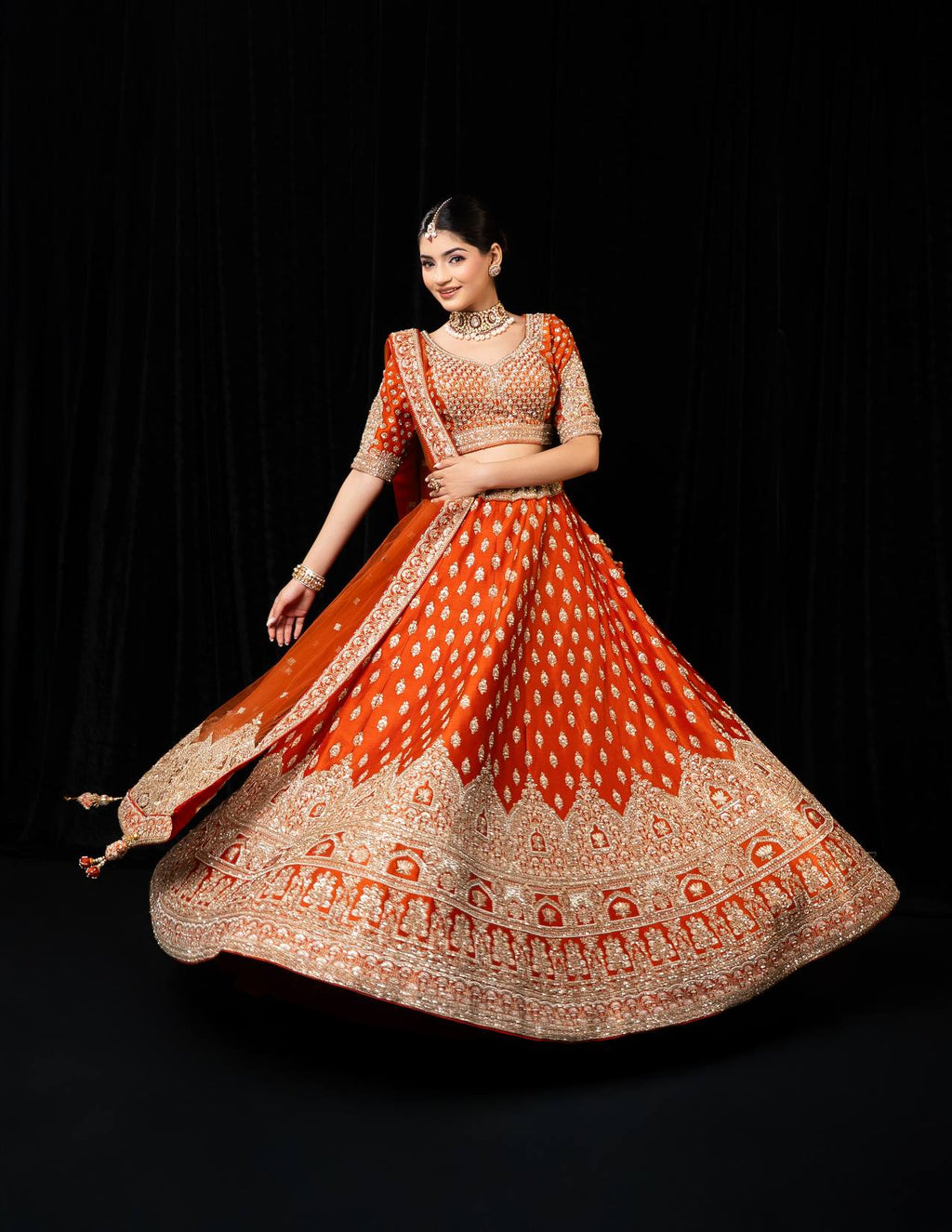Opulent Orange Silk Bridal Lehenga with Heavy Golden Zari and Sequin Embroidery