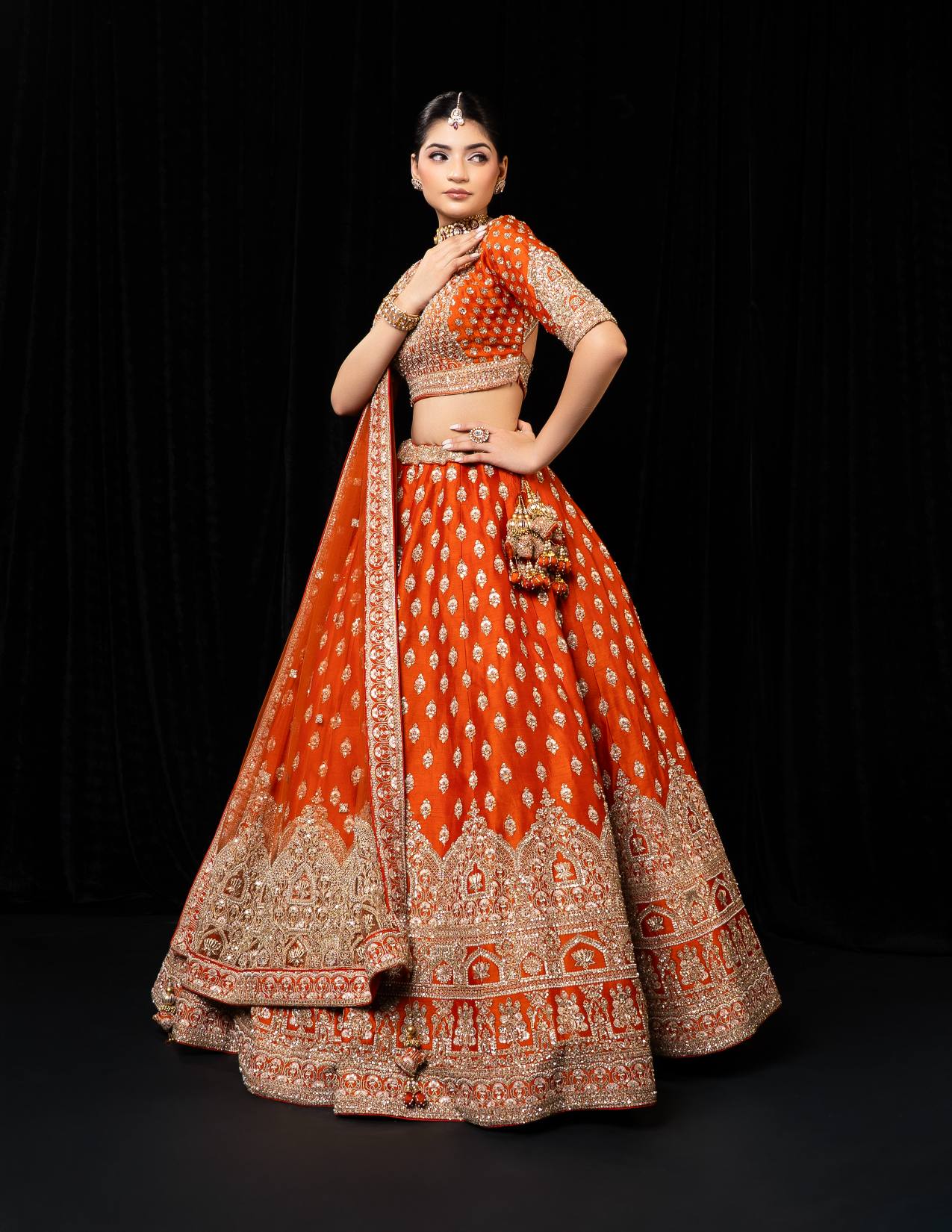Opulent Orange Silk Bridal Lehenga with Heavy Golden Zari and Sequin Embroidery