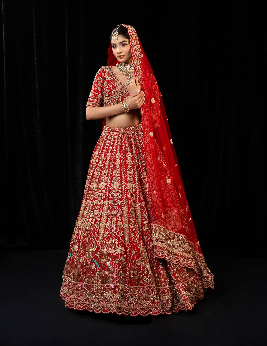 Exquisite Crimson Red Bridal Lehenga with Heavy Golden Zari and Intricate Hand Embroidery