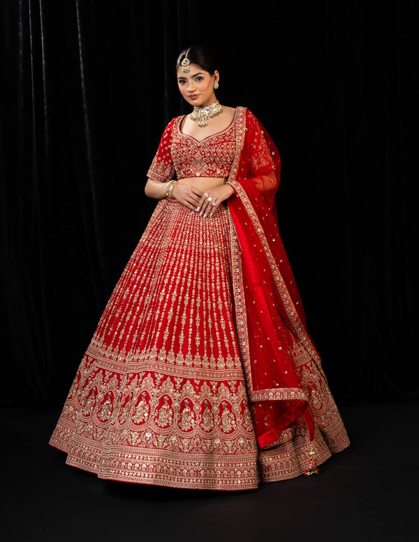 Elegant Red Bridal Lehenga with Golden Embroidery and Deep Back Blouse Design