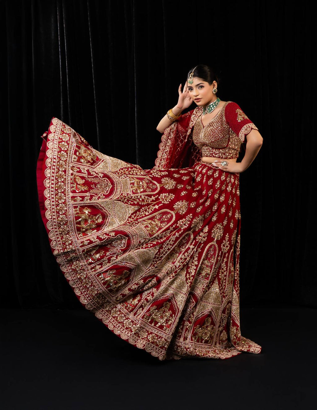 Luxurious Maroon Velvet Bridal Lehenga with Golden Jharokha Embroidery and Scalloped Border