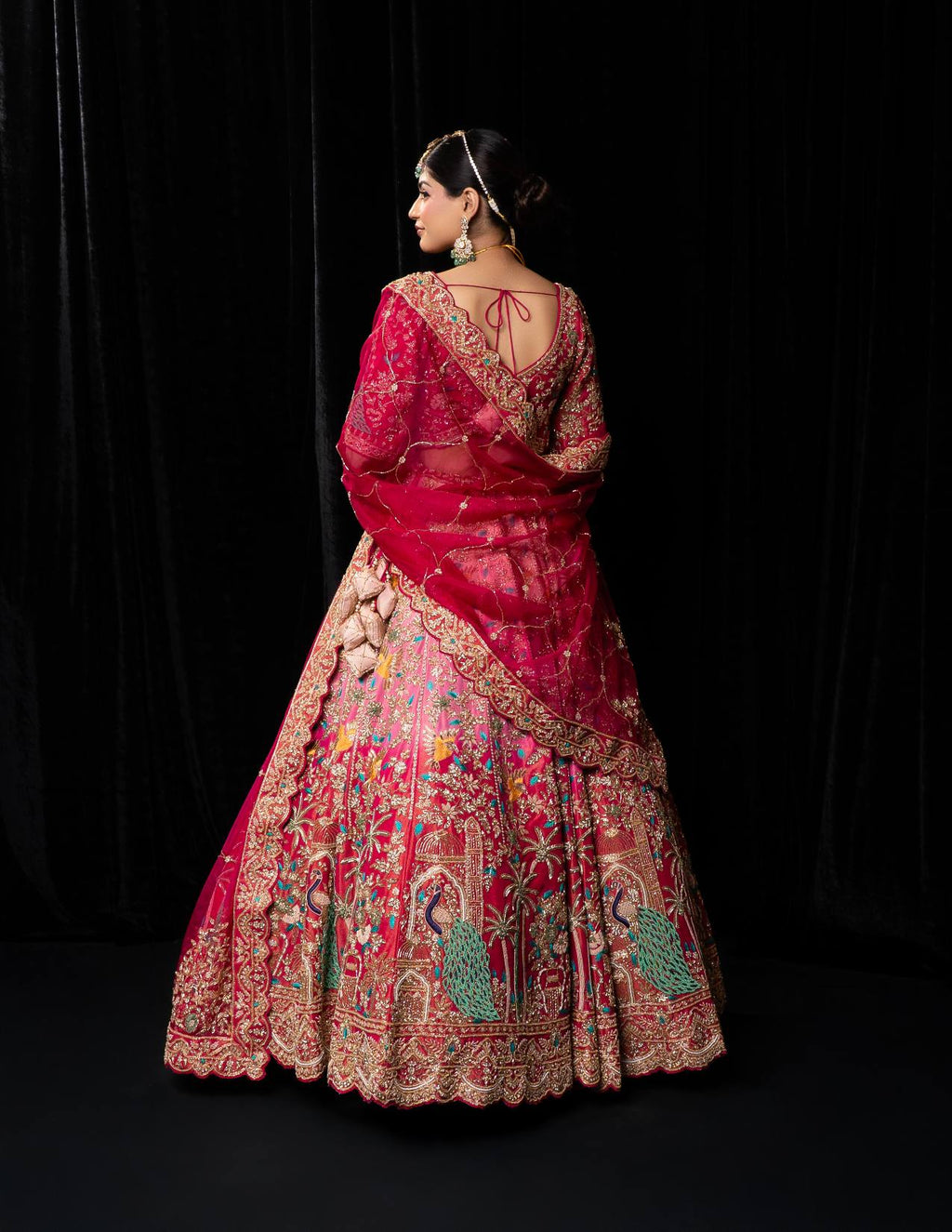 Stunning Pink Red Bridal Lehenga with Multicolor Peacock Embroidery and Floral Motifs