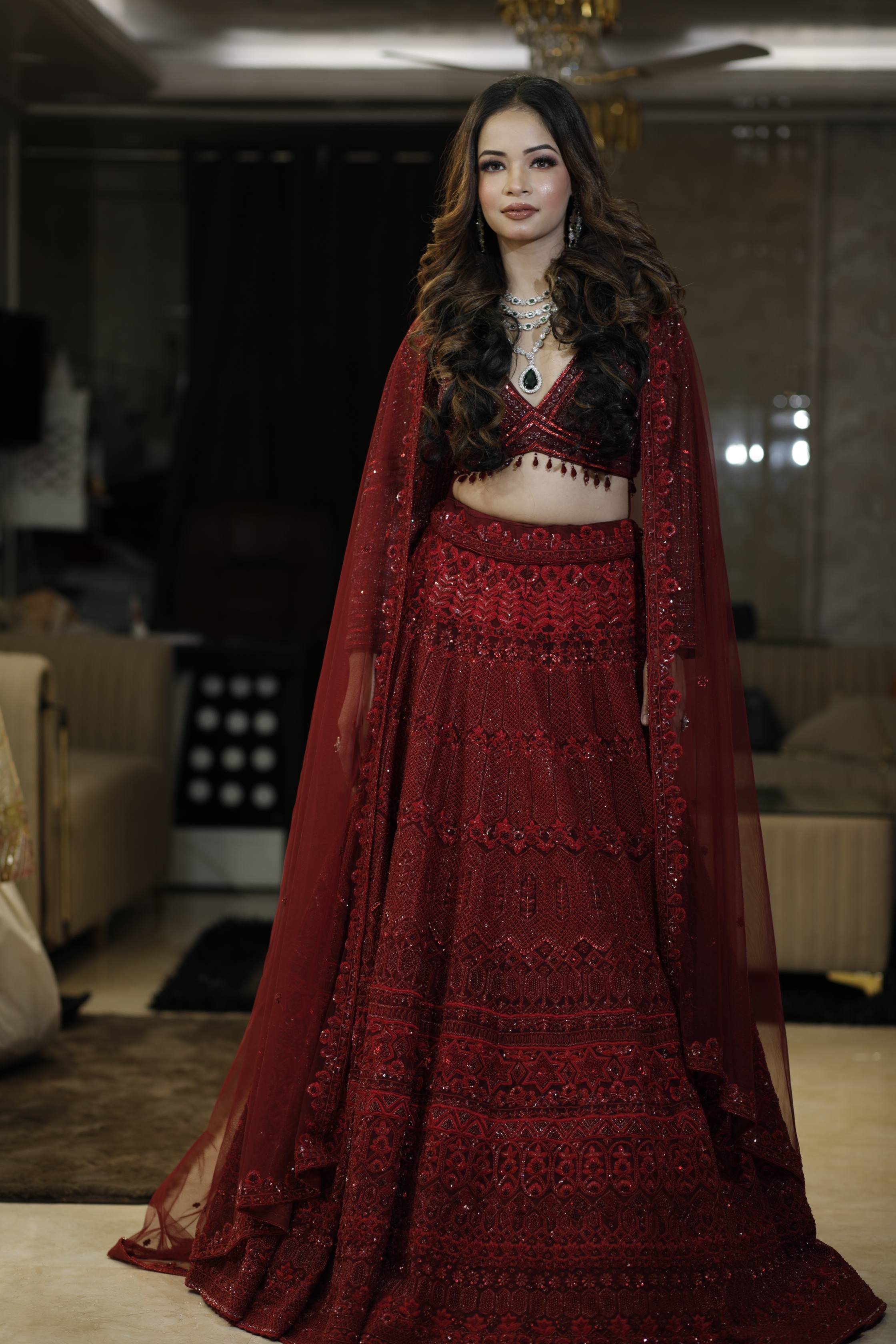 Regal Maroon Bridal Lehenga with Heavy Sequin Embroidery and Sheer Cape