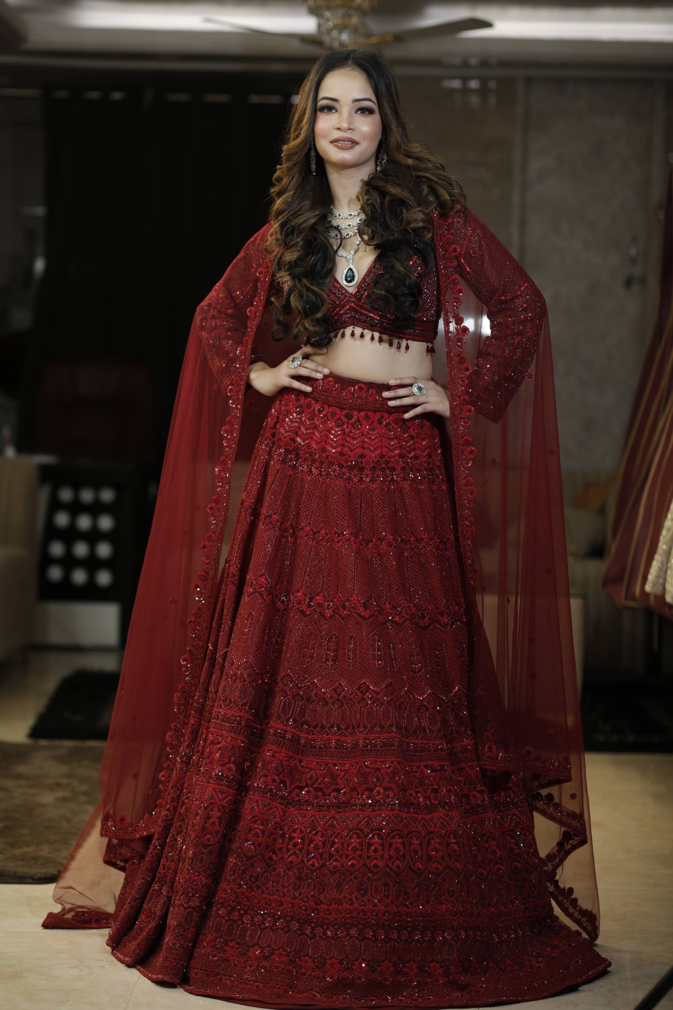 Regal Maroon Bridal Lehenga with Heavy Sequin Embroidery and Sheer Cape