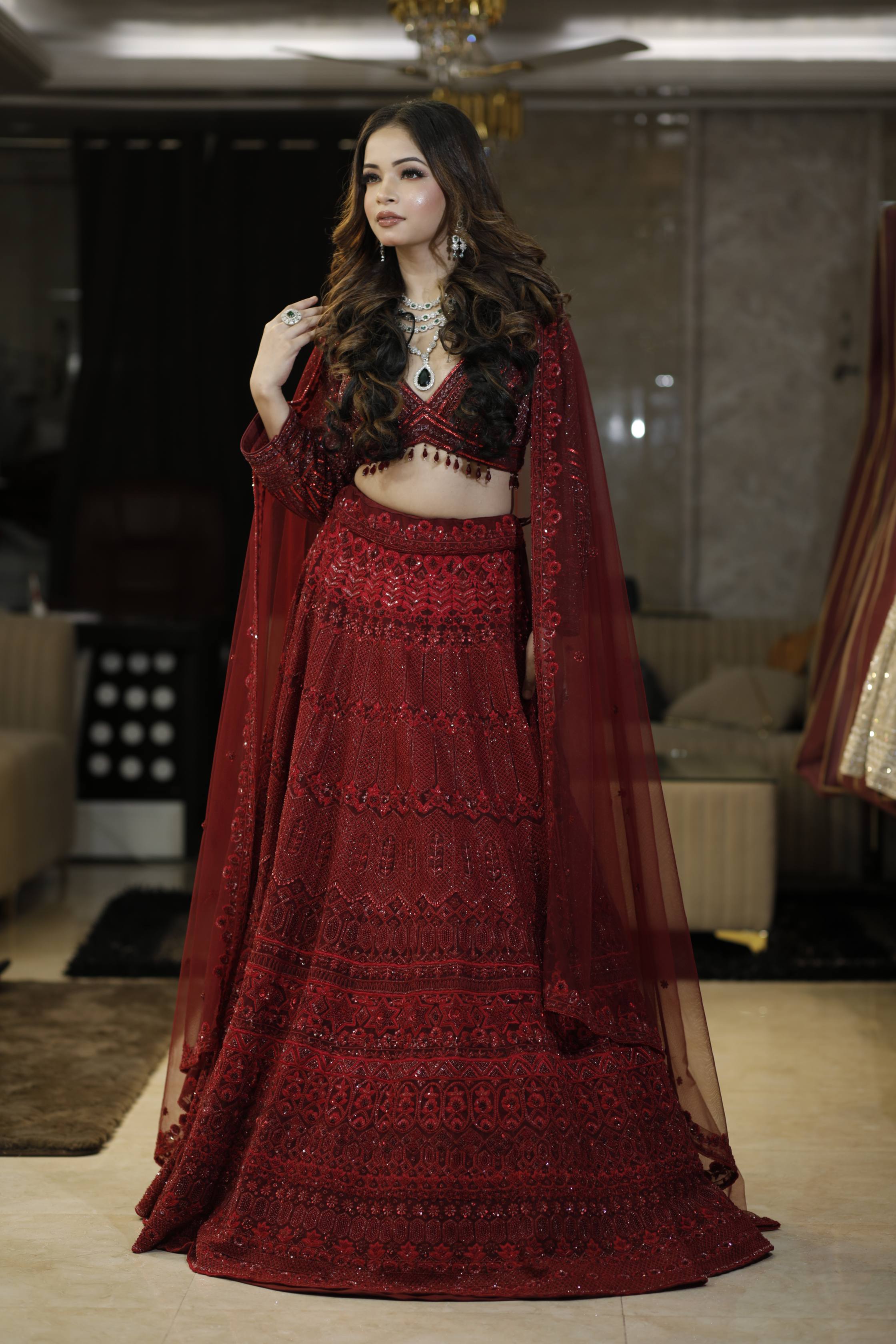 Regal Maroon Bridal Lehenga with Heavy Sequin Embroidery and Sheer Cape